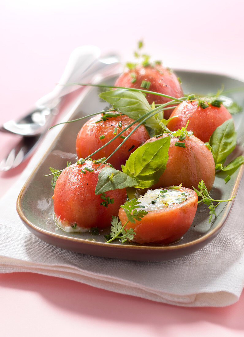 Tomatoes stuffed with goat's cheese,herbs and olive oil