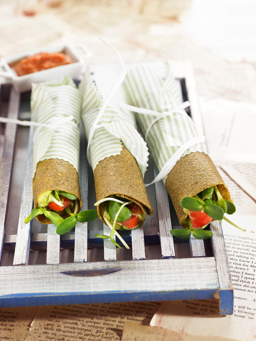 Guacamole and tomato cereal galette rolls