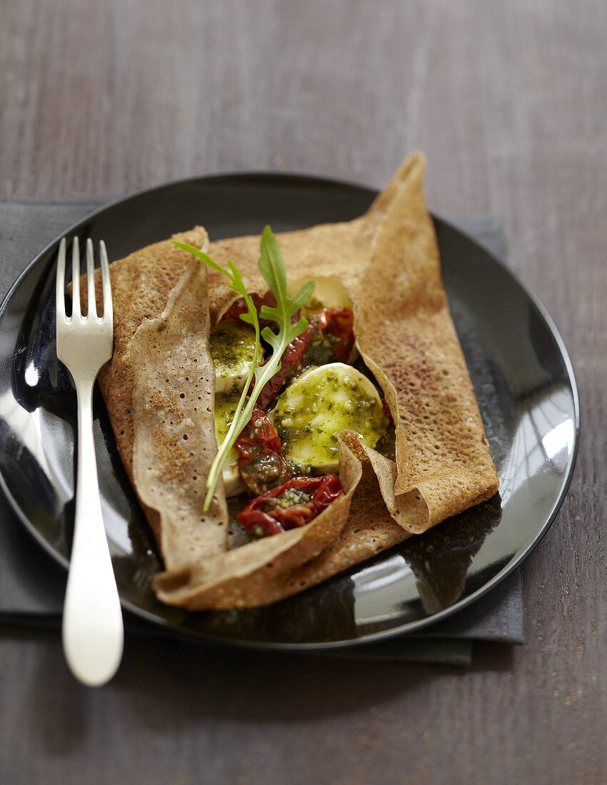 Goat's cheese Buchette,sun-dried tomatoes and pesto buckwheat galette