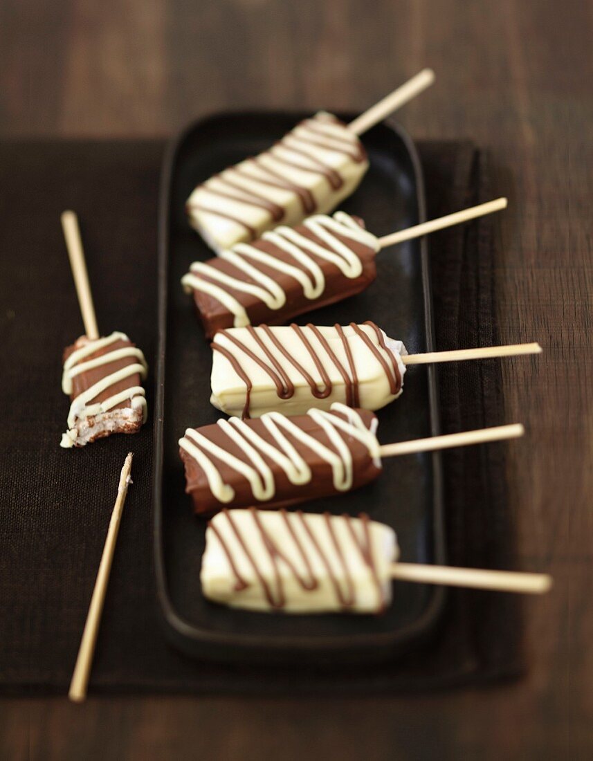Marshmallow and white and milk chocolate lollipops