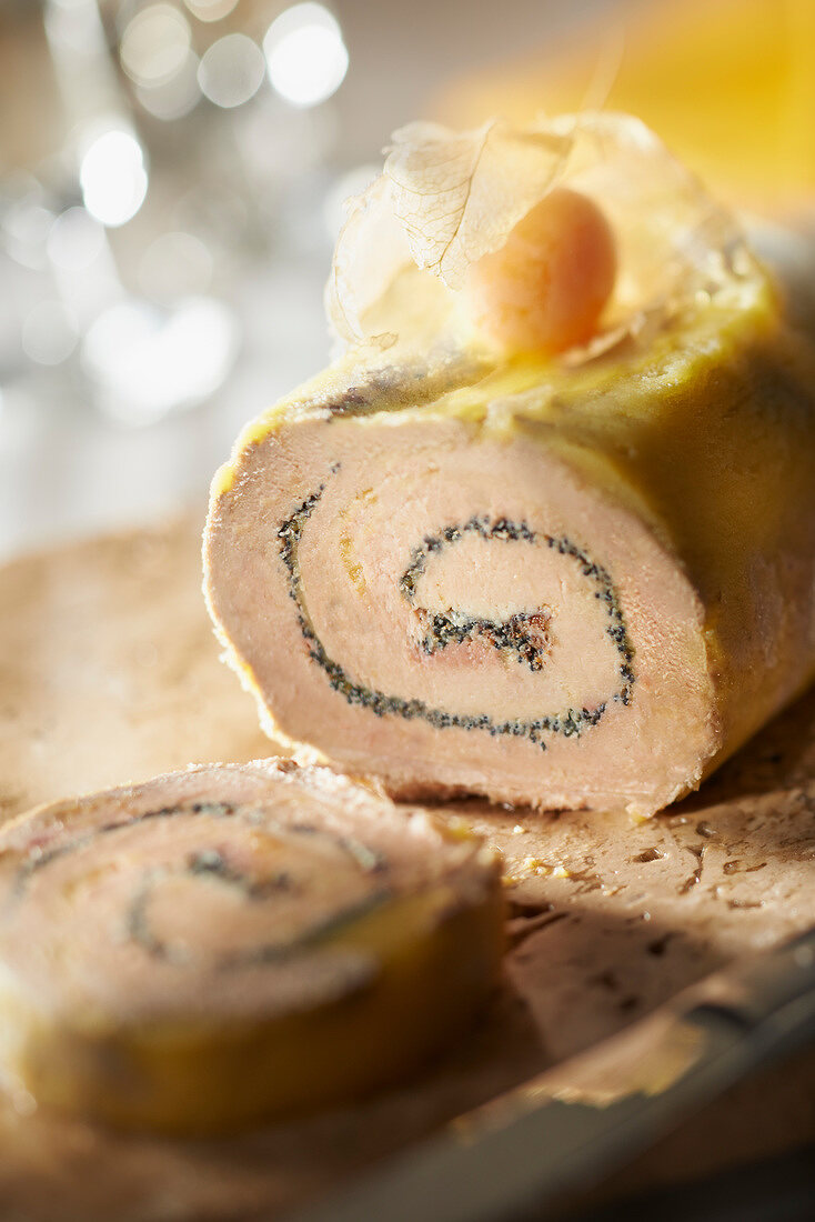Rolled foie gras with poppyseeds and spices