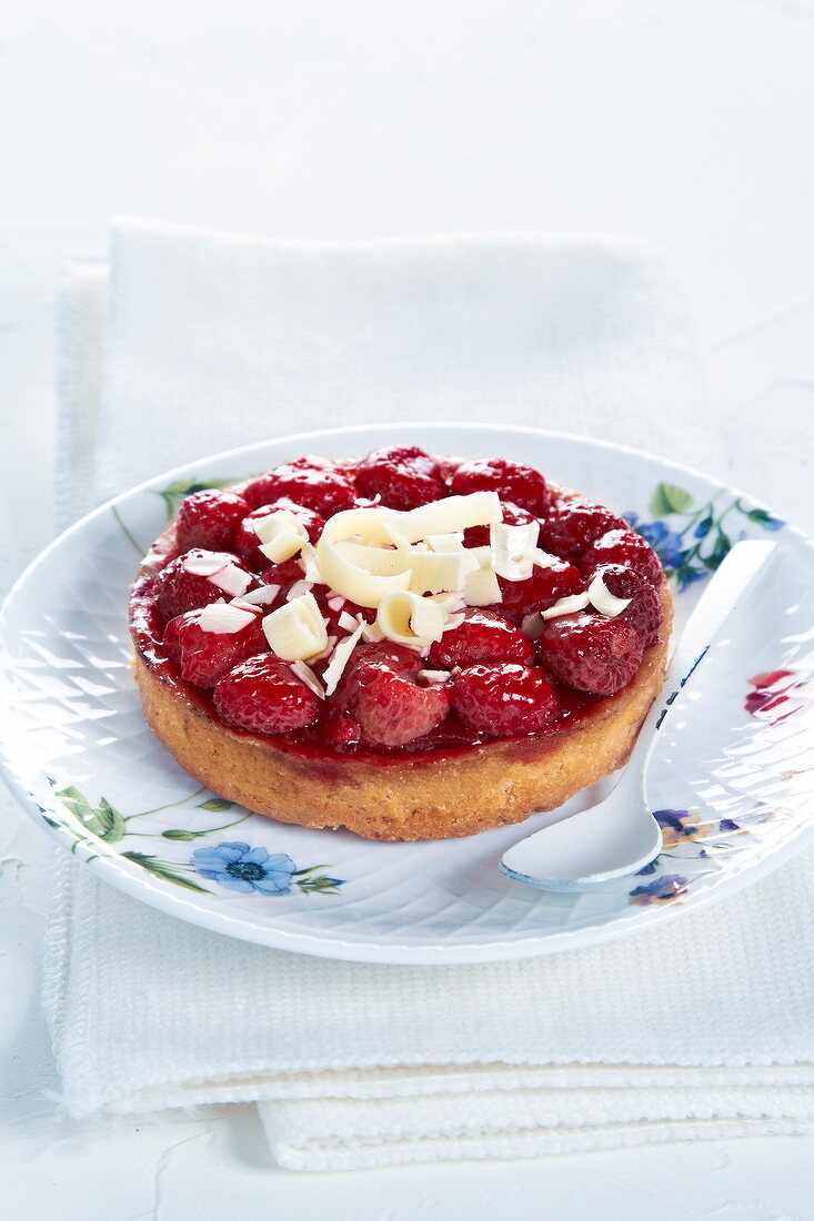Raspberry and flaked white chocolate tartlet