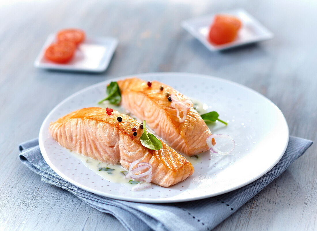 Pieces of salmon in creamy sauce