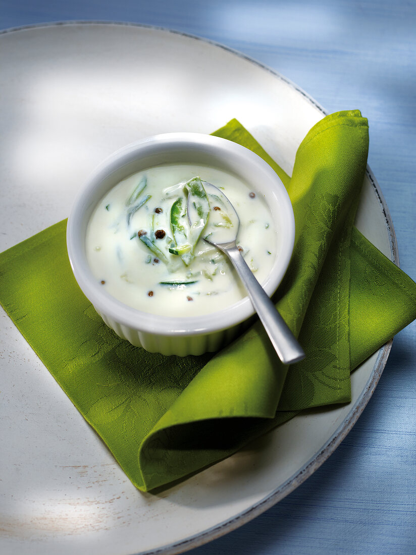 Creamy cucumber sauce with basil and geen pepper