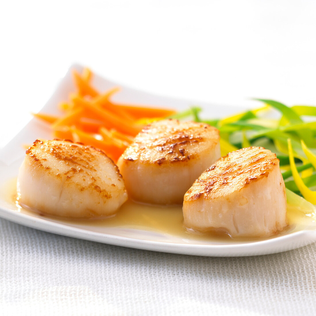 Roasted scallops with truffle-flavored oil