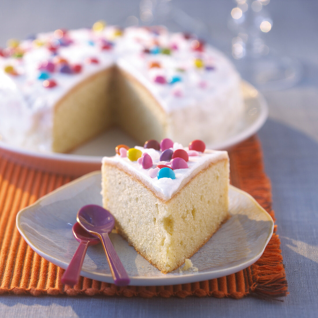 Vanilla pound cake with icing and Smarties