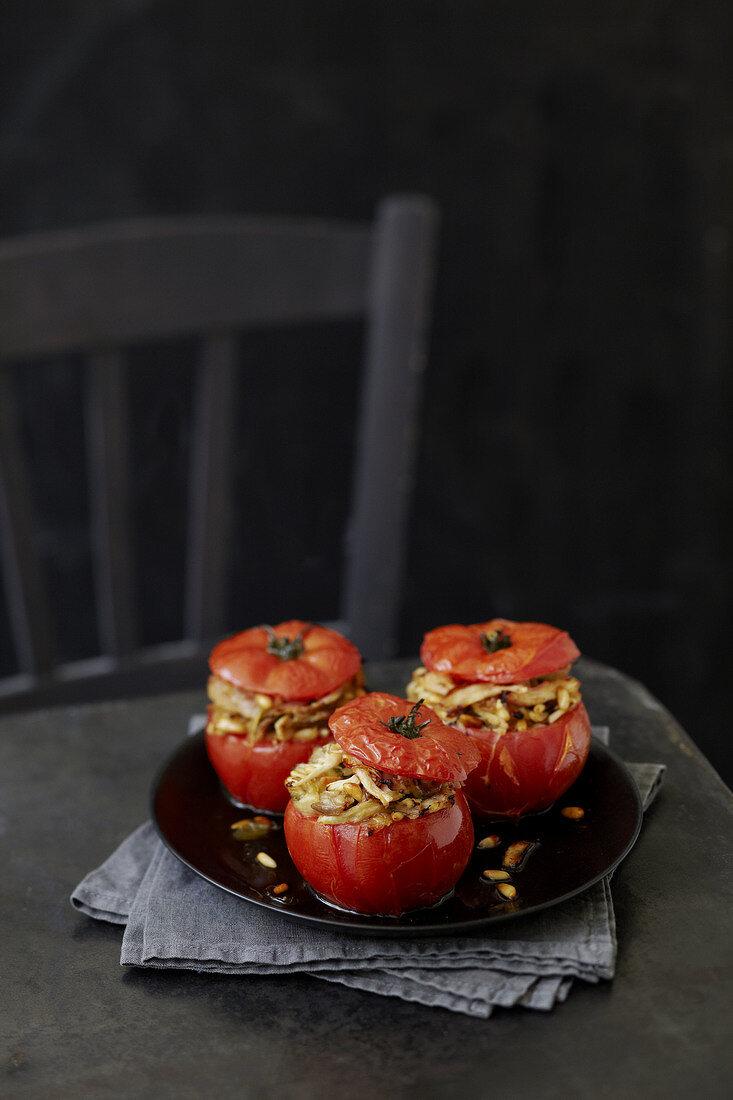 Tomatoes stuffed with chicken,onions and pine nuts