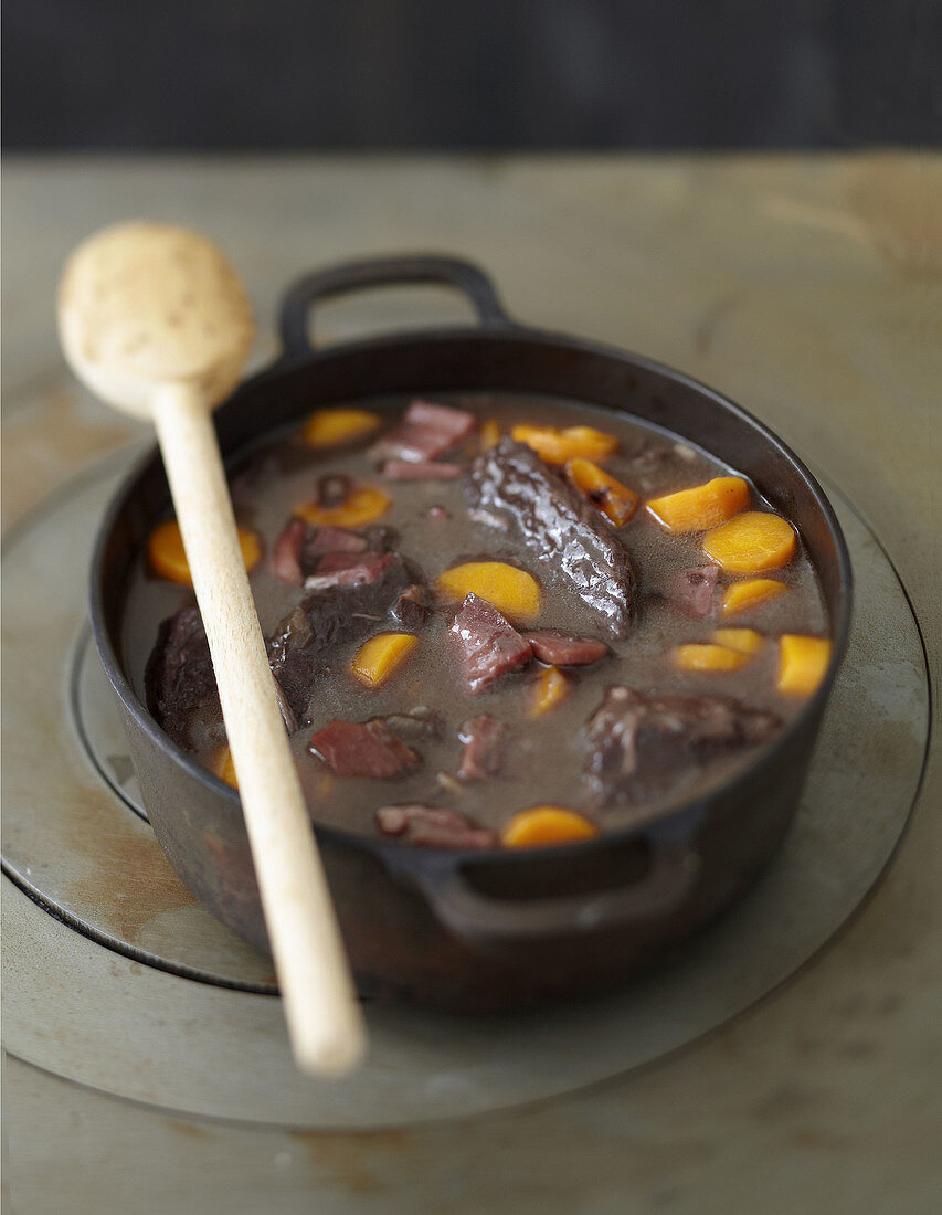 Beef,raw ham,red wine and carrot stew