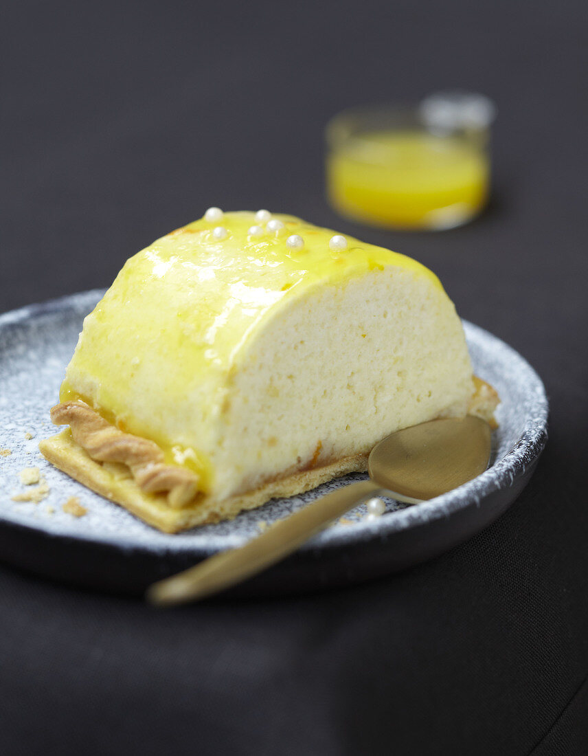 Slice of lemon curd log cake