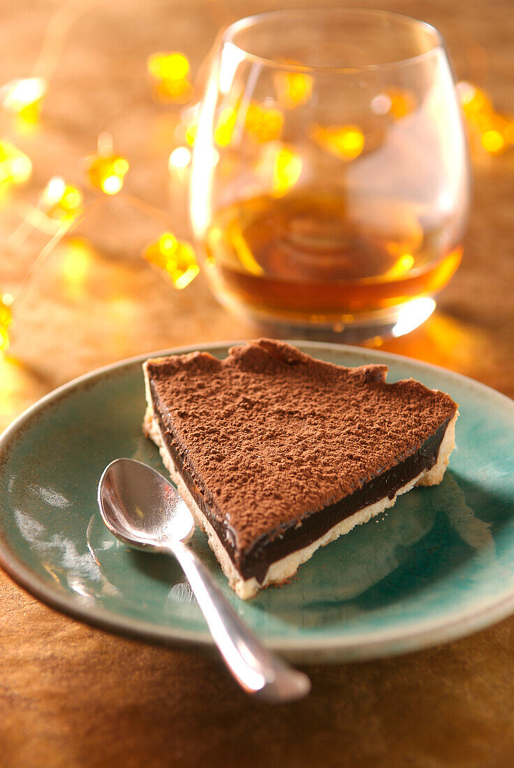 Slice of bitter chocolate and Cognac pie