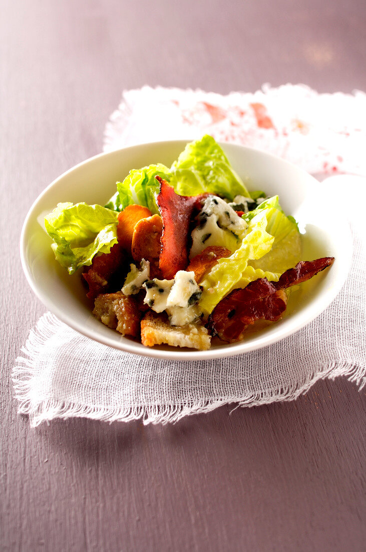 Cos lettuce with raw ham, croutons and Roquefort