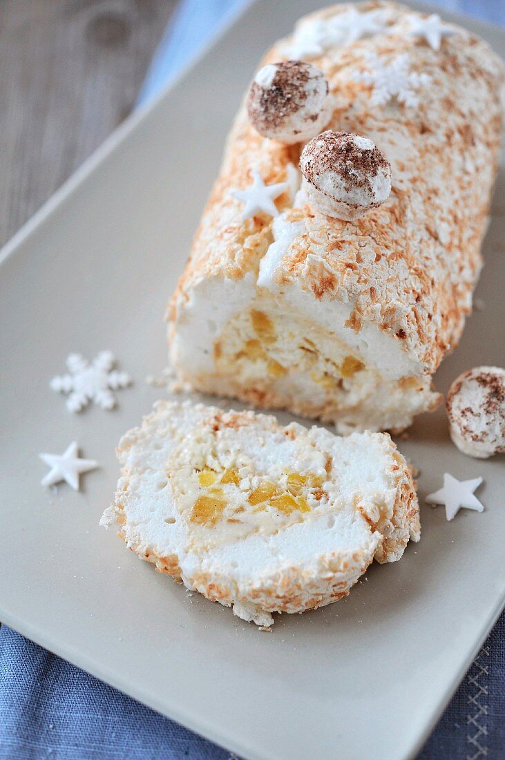 Exotic meringue log cake