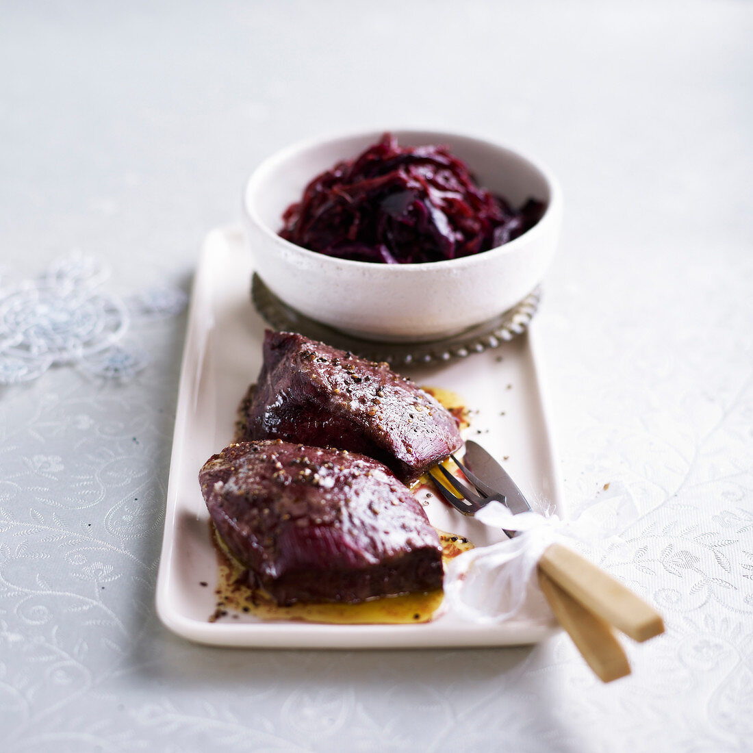 Roasted doe with stewed red cabbage