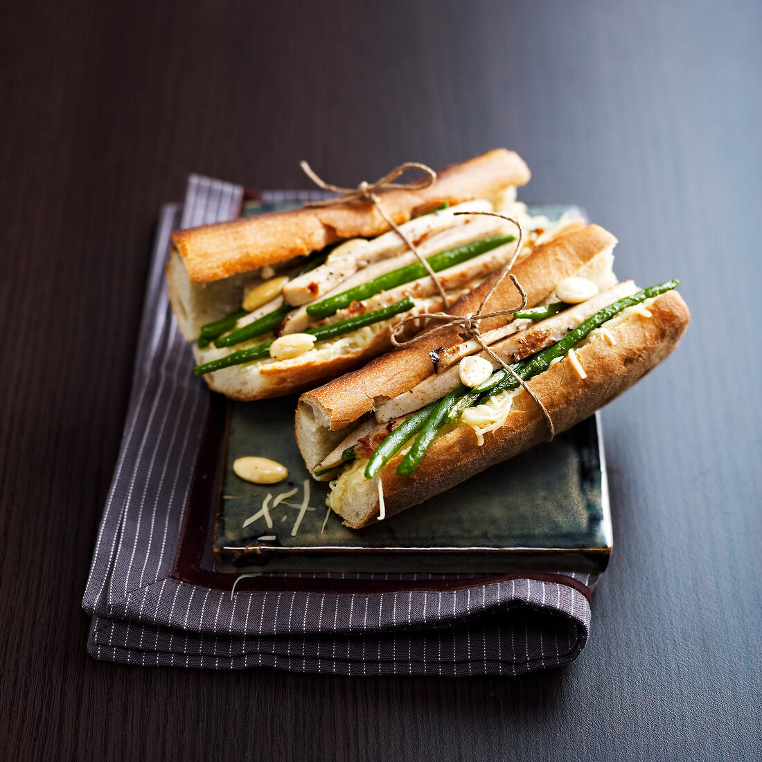 Chicken, green bean, almond and cheese paninis