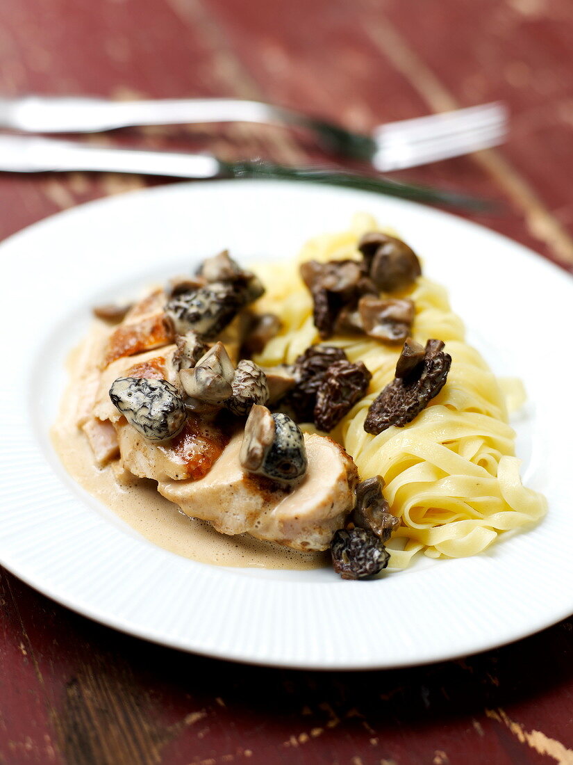 Chicken, yellow wine and morel casserole sealed with pastry with fresh tagliatelles