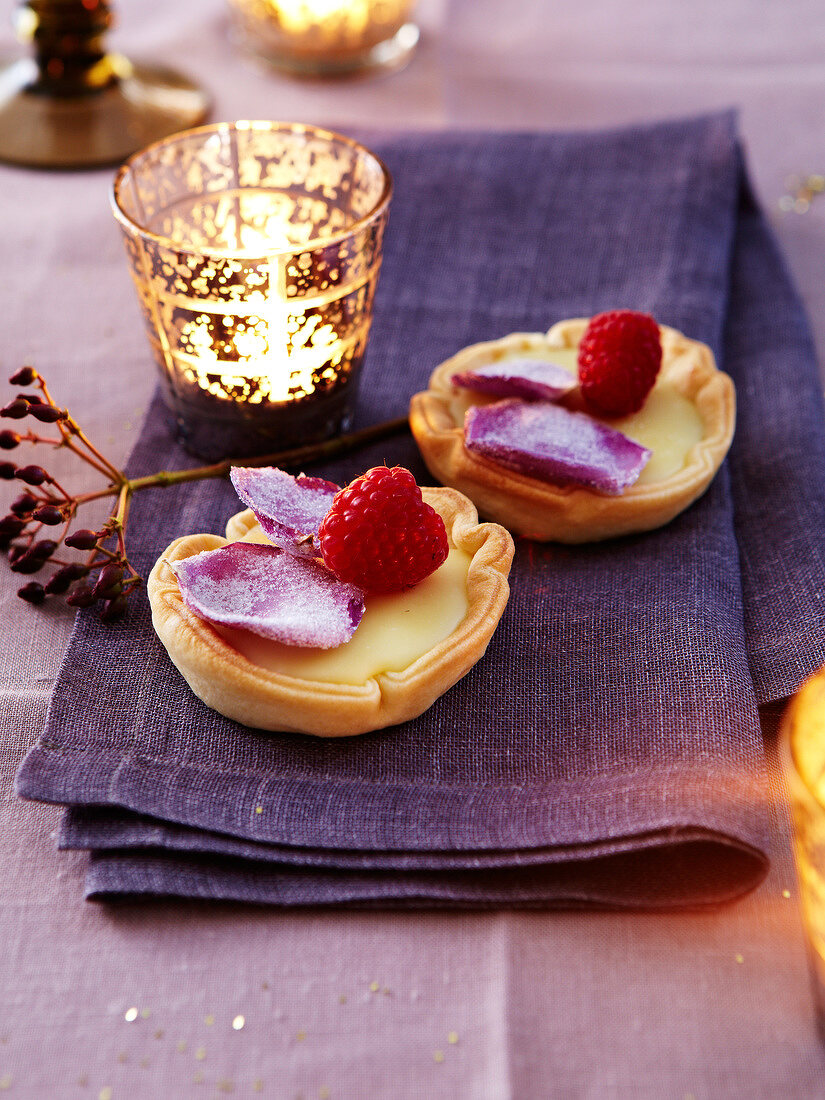 Lemon curd and crystallized rose petal pies