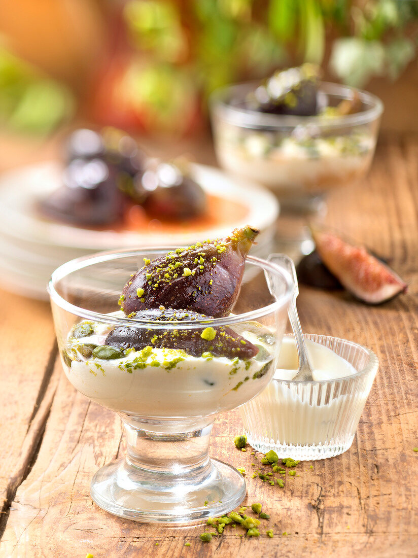 Poached figs in syrup with pistachio creme fraiche