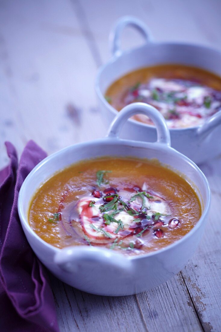 Pumpkin soup with pomegranate seeds