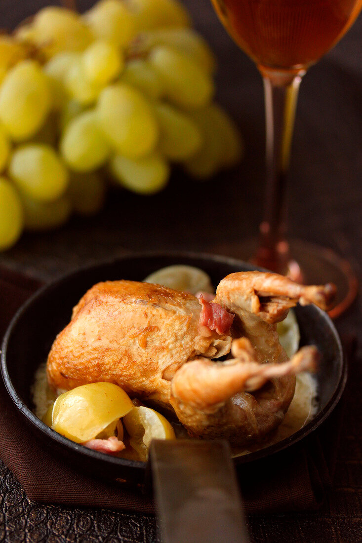Quail with white grapes
