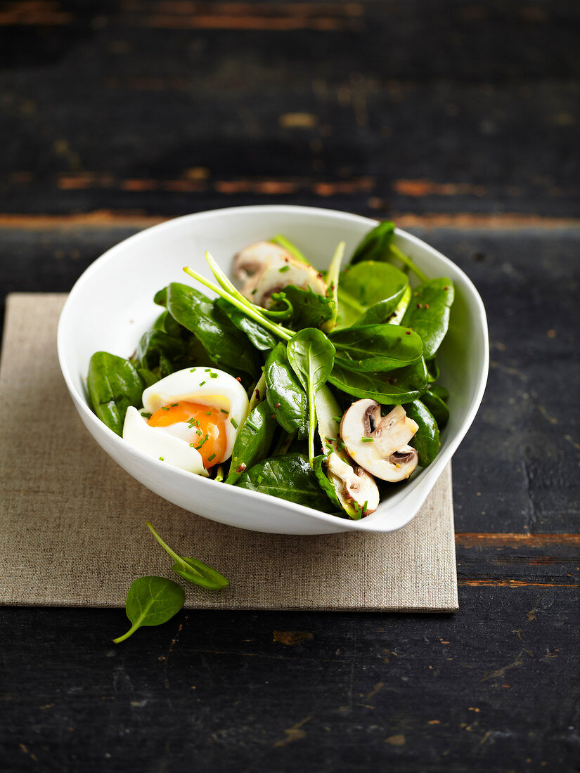 Spinach, mushroom and soft-boiled quail's egg salad