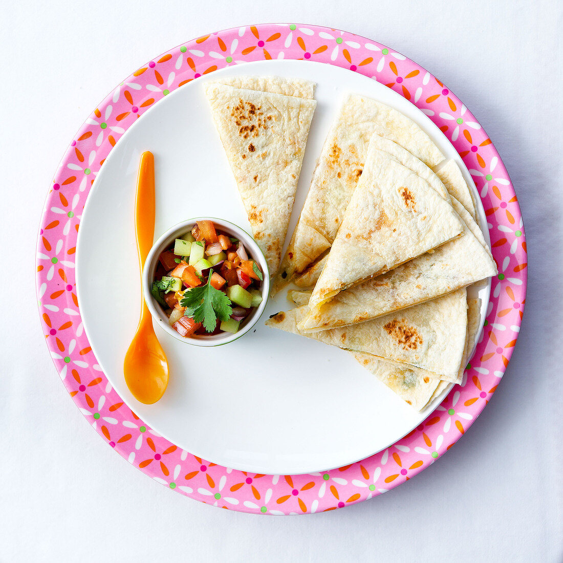 Cheese quesadillas with thinly diced vegetable salsa