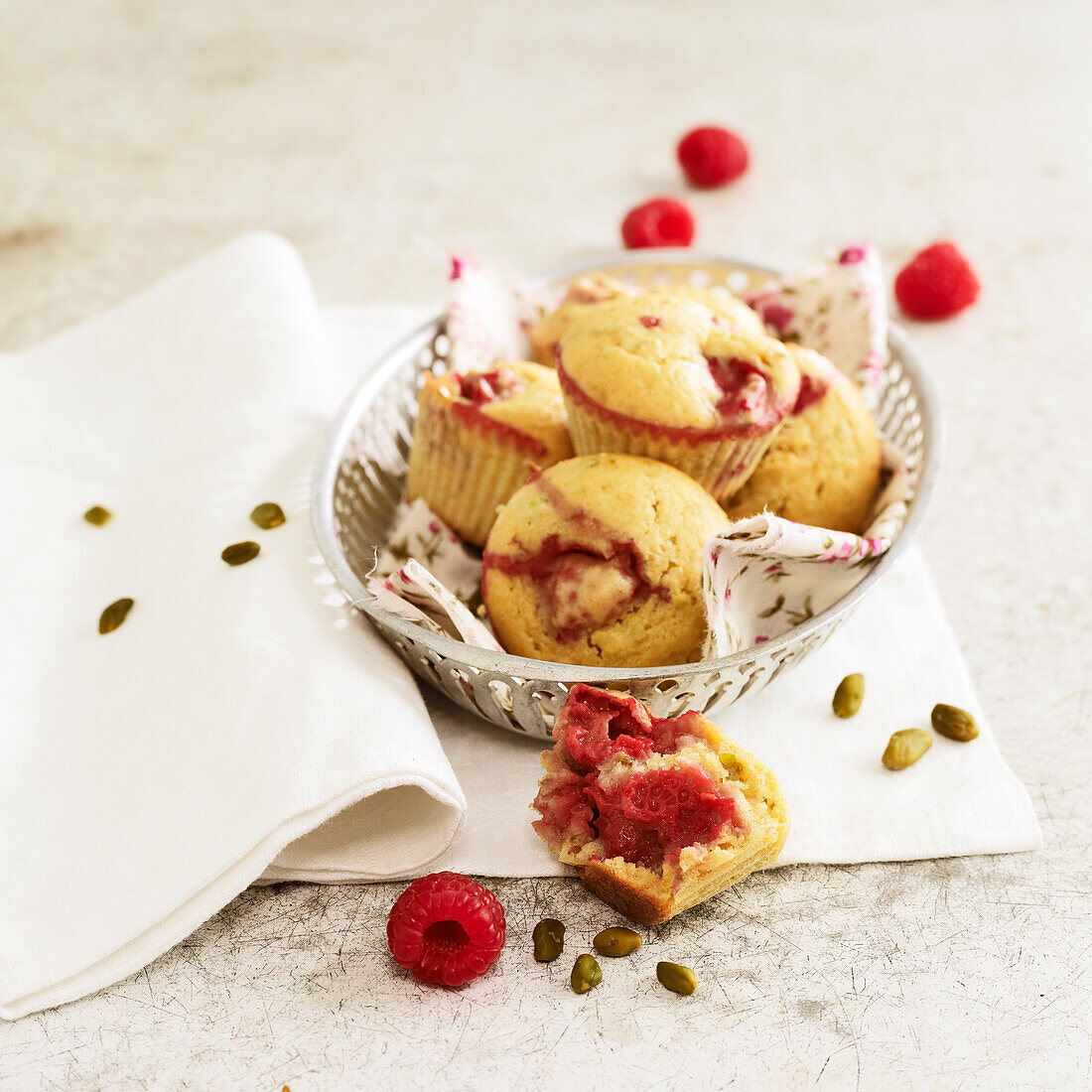Mini raspberry-pistachio muffins