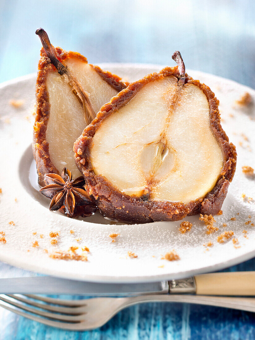 Roasted pears in gingerbread crust and star anise syrup
