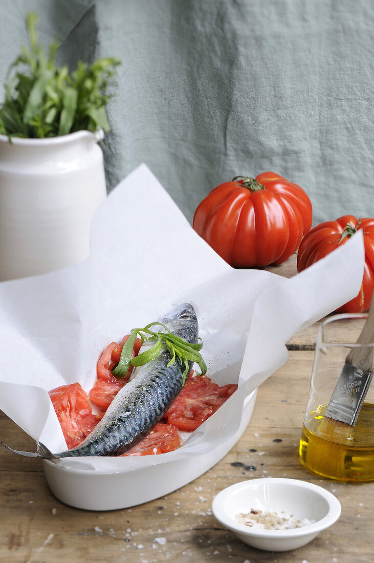Mackerel and oxtail tomatoes cooked in wax paper