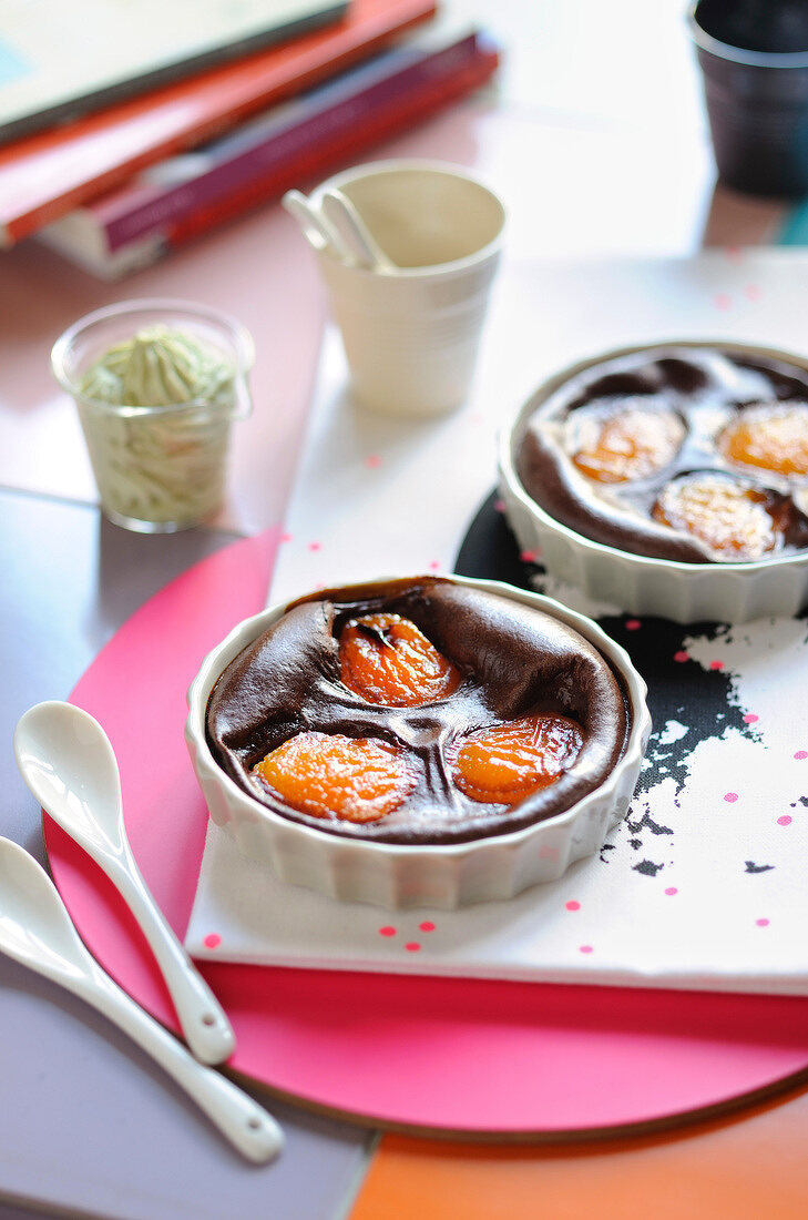 Small chocolate and apricot batter puddings