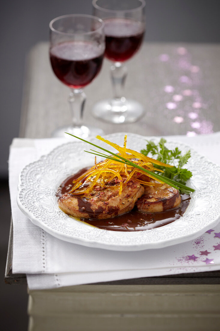 Pan-fried foie gras in chocolate sauce with orange zests