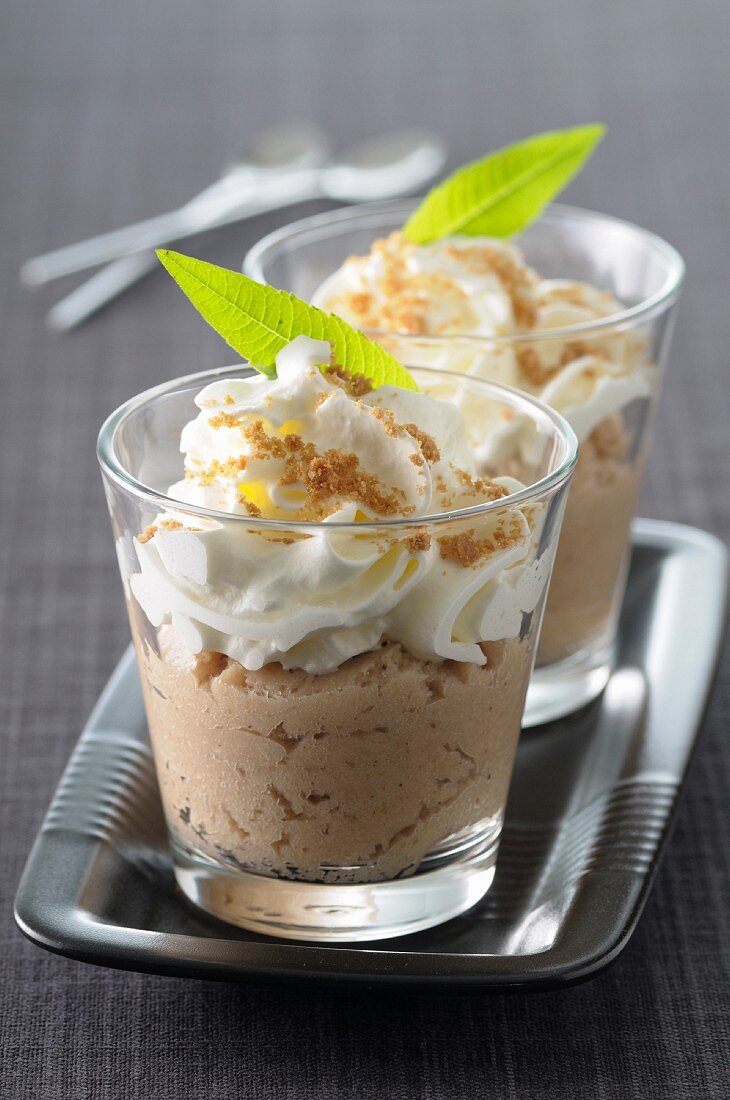 Chestnut mousse with whipped cream and crushed speculos biscuits