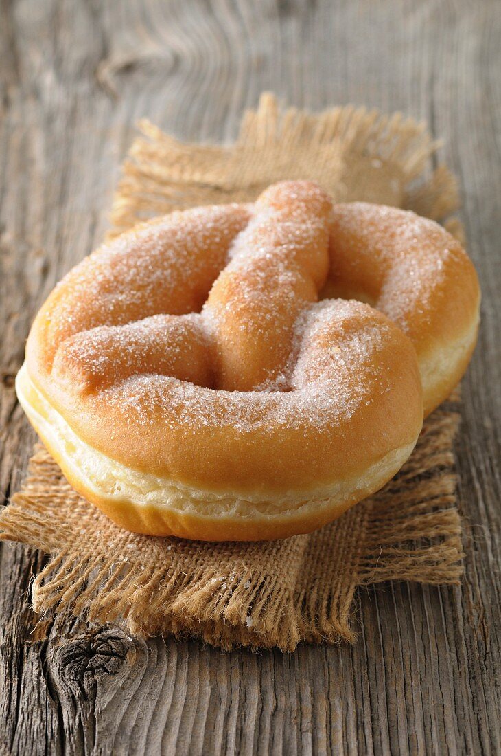 Bretzel-shaped sugar donut