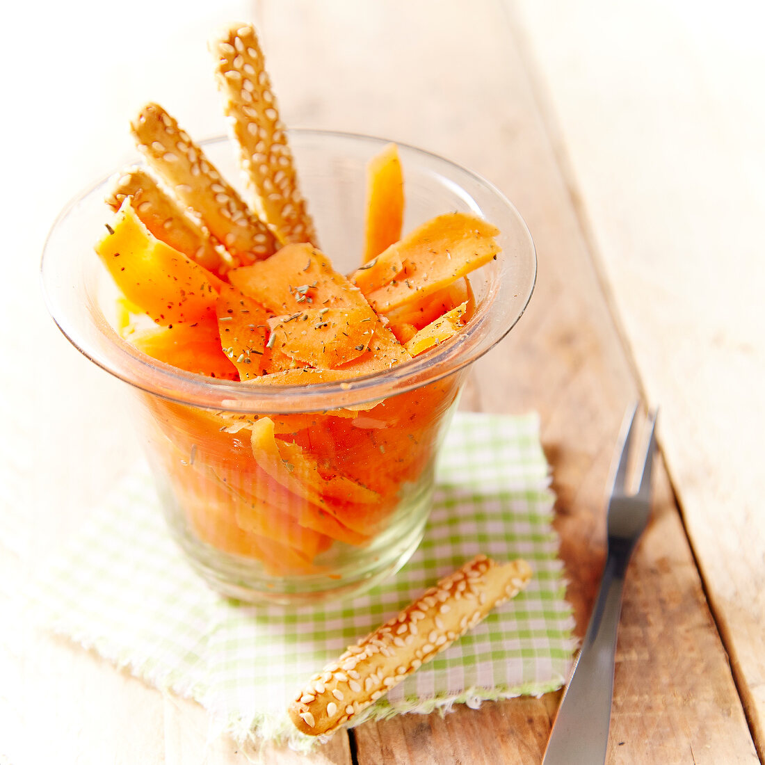 Carrot salad with herbs and breadsticks