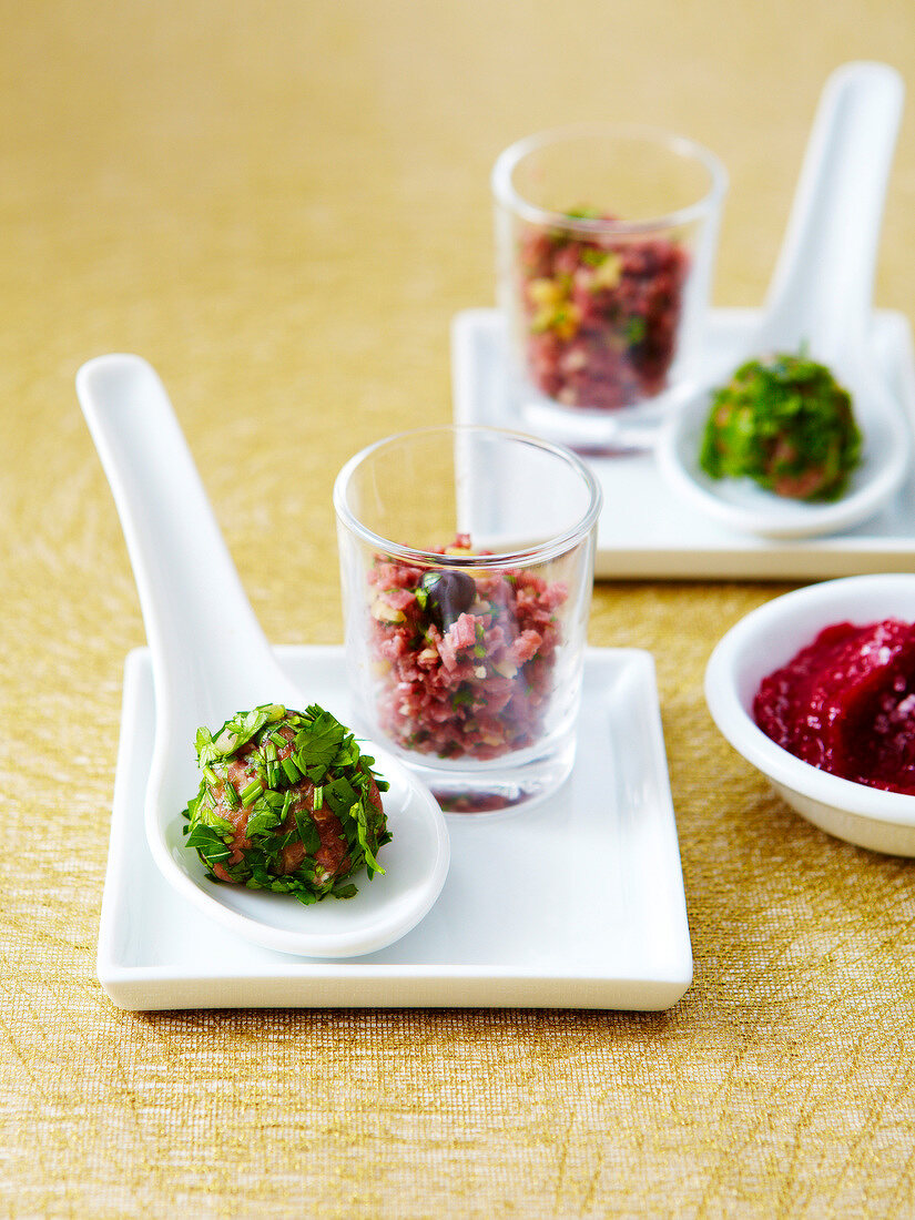 Trtare duo : beef and herb tartare ,smoked duck tartare ,cranberry and wasabi sauce