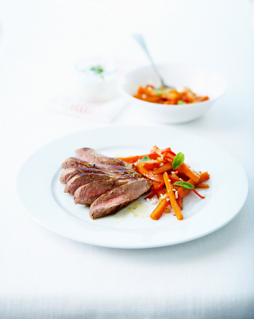 Beef fillet and carrots with garlic and mint