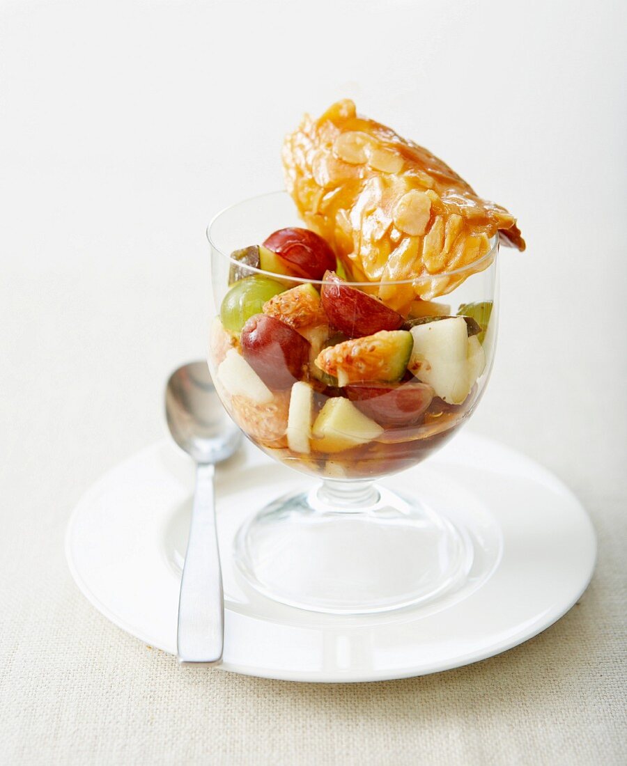 Autumn fruit salad with caramelized almond tuiles