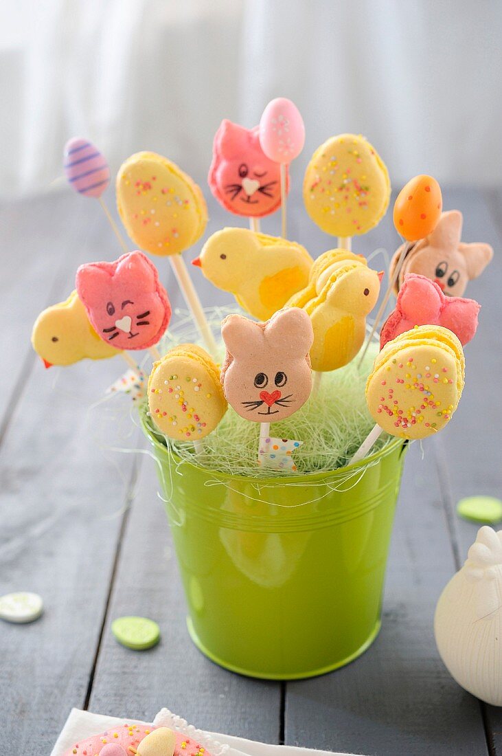 Macaroon lollies shaped like Easter bunnies, chicks and Easter eggs