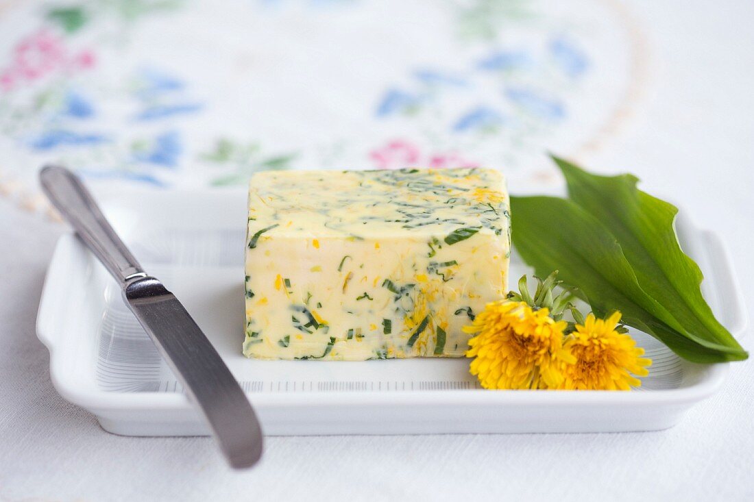 Herb butter with wild garlic and dandelion flowers
