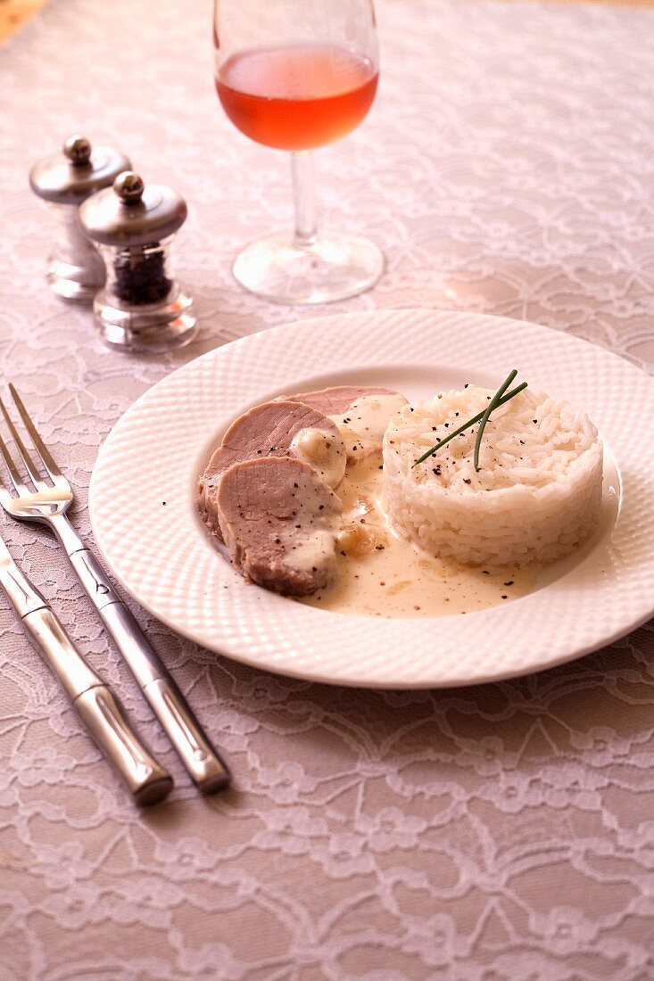 Pork filet mignon in creamy Maroilles sauce and rice
