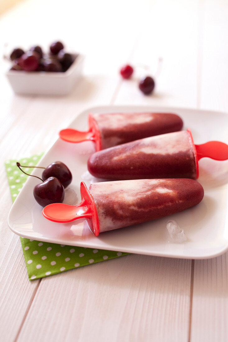 Cherry and fromage blanc marbled ice cream pops