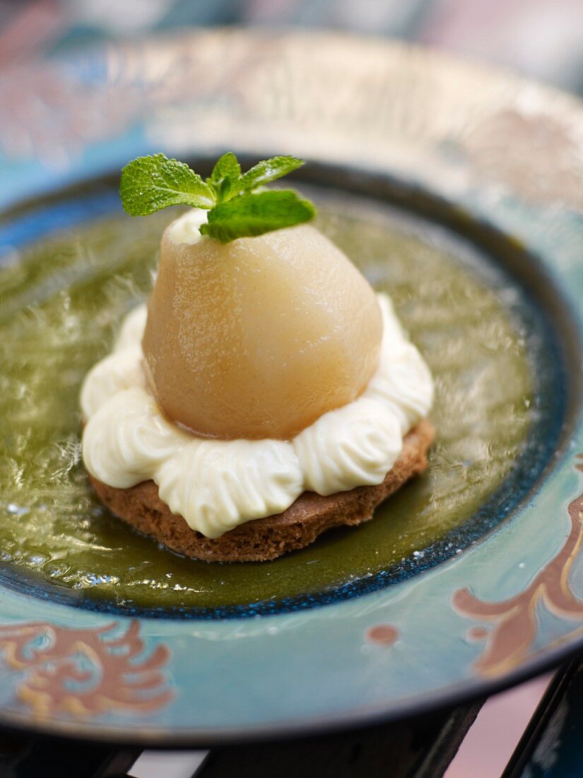 Poached pear on a chestnut shortbread,whipped cream and mint-lemon marmelade