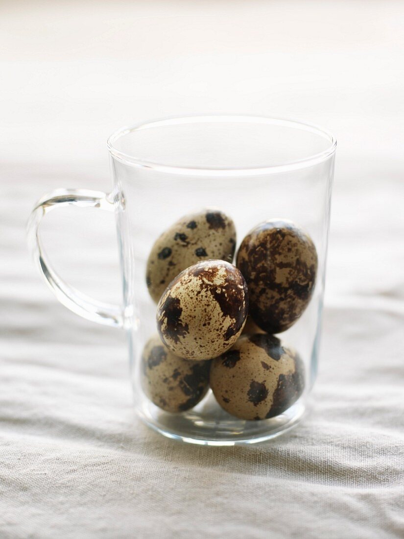 Quail's eggs in a glass cup