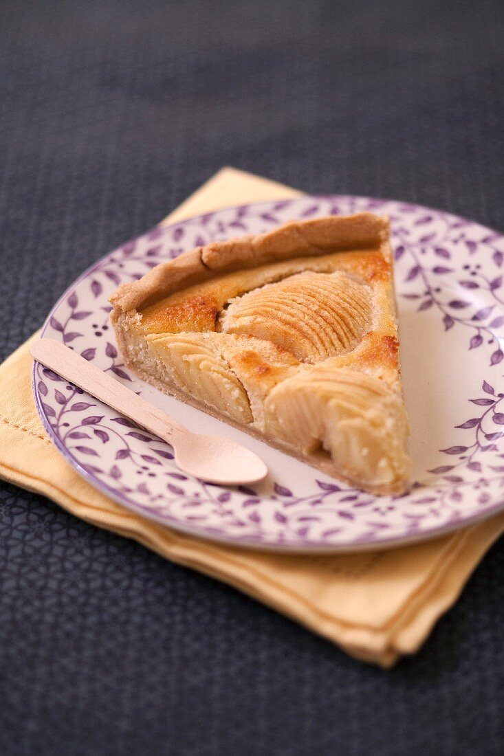 Slice of apple and almond pie