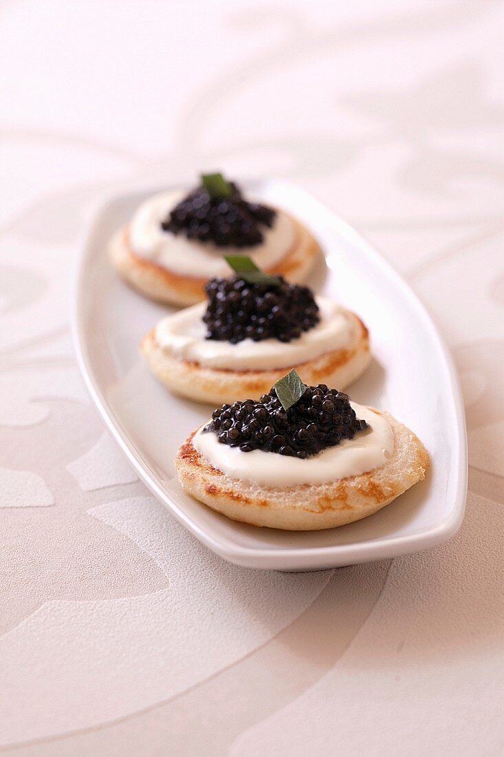 Blinis with tarragon cream and caviar