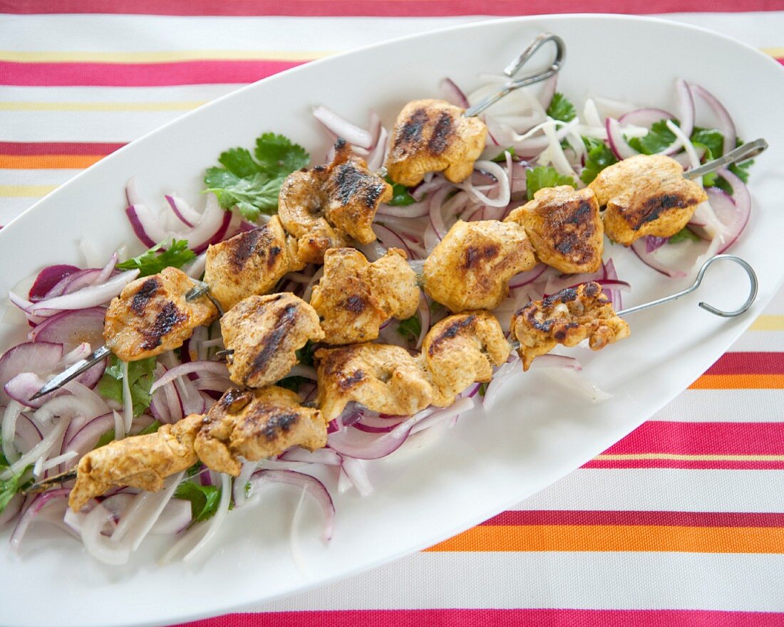 Curry-flavored chicken skewers