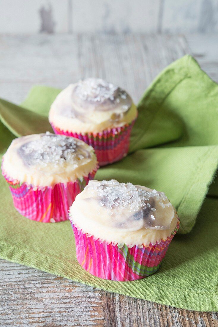 Cupcakes with blackberry frosting