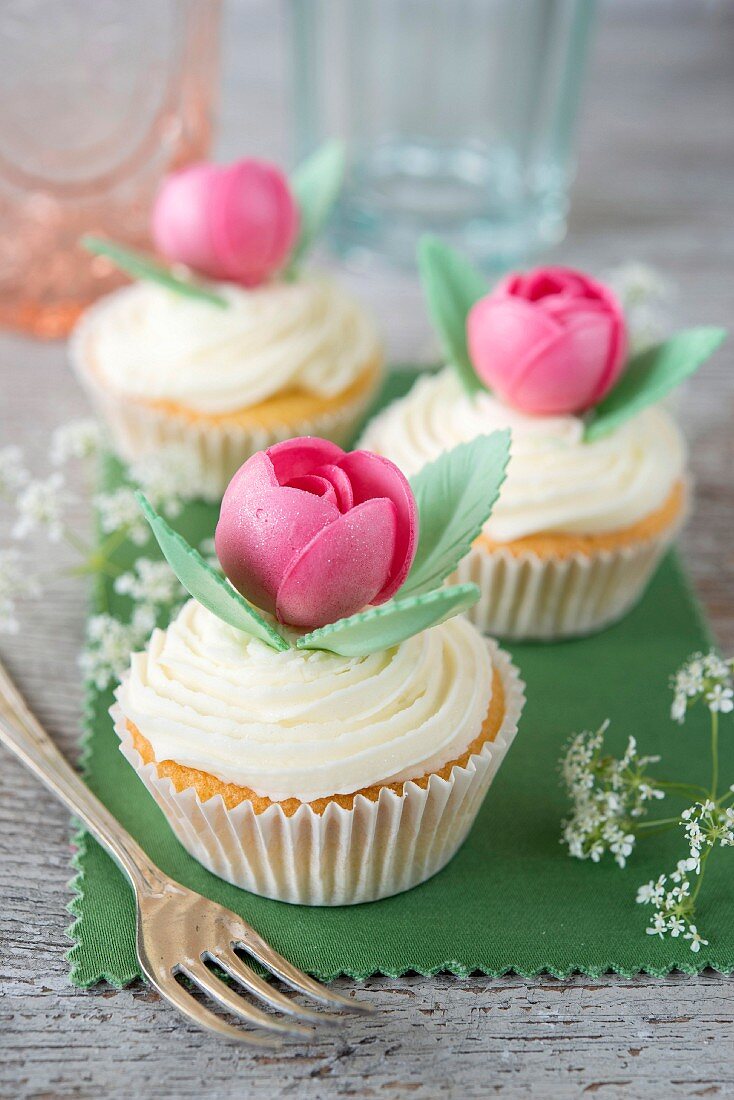 Cupcakes decorated with an almond paste rose