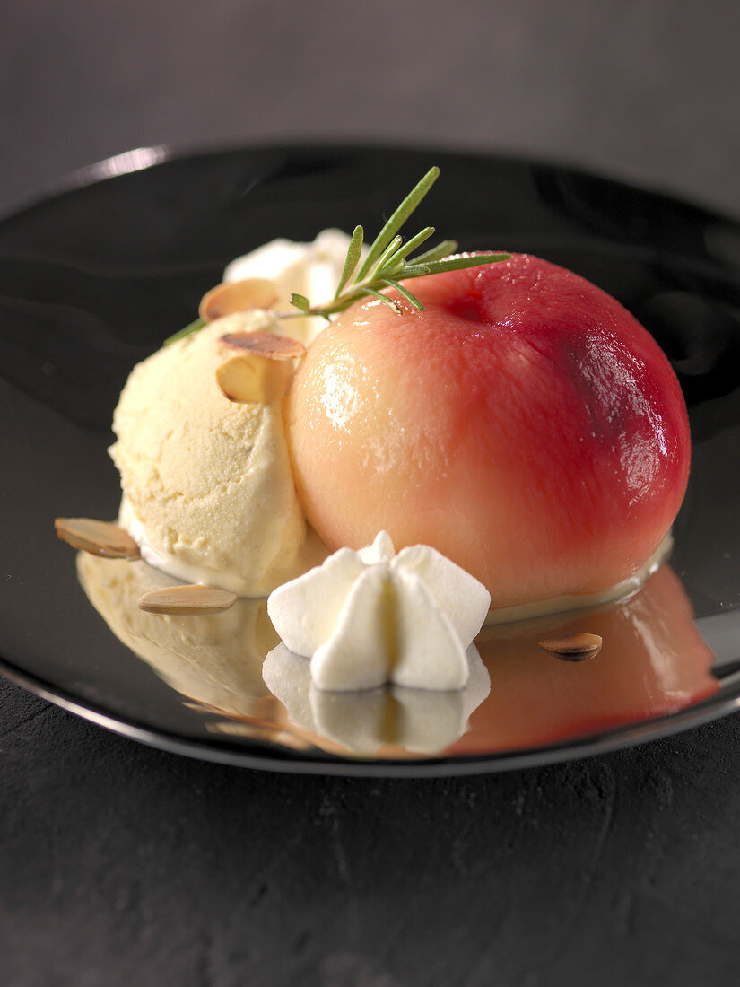 Peach poached in rosemary infusion with almond ice cream