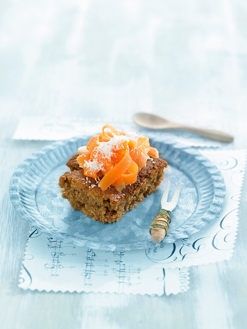 Cake with carrots and grated macadamia nuts