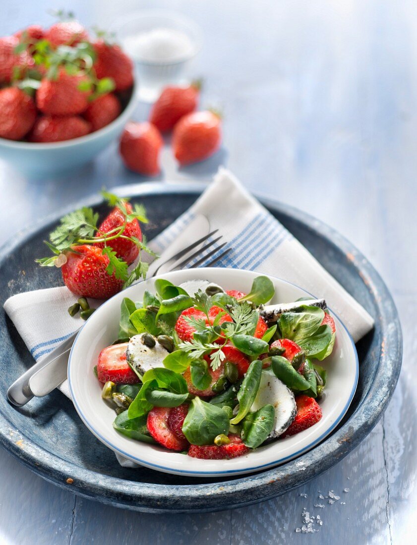 Corn lettuce,goat's cheese and strawberry salad